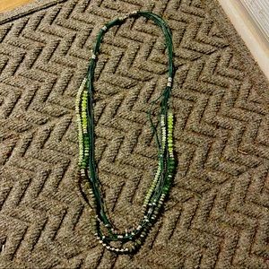 Long multi string green/grey/silver beaded necklace